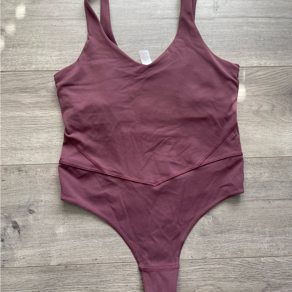 Sleek V-Neck Wine Bodysuit